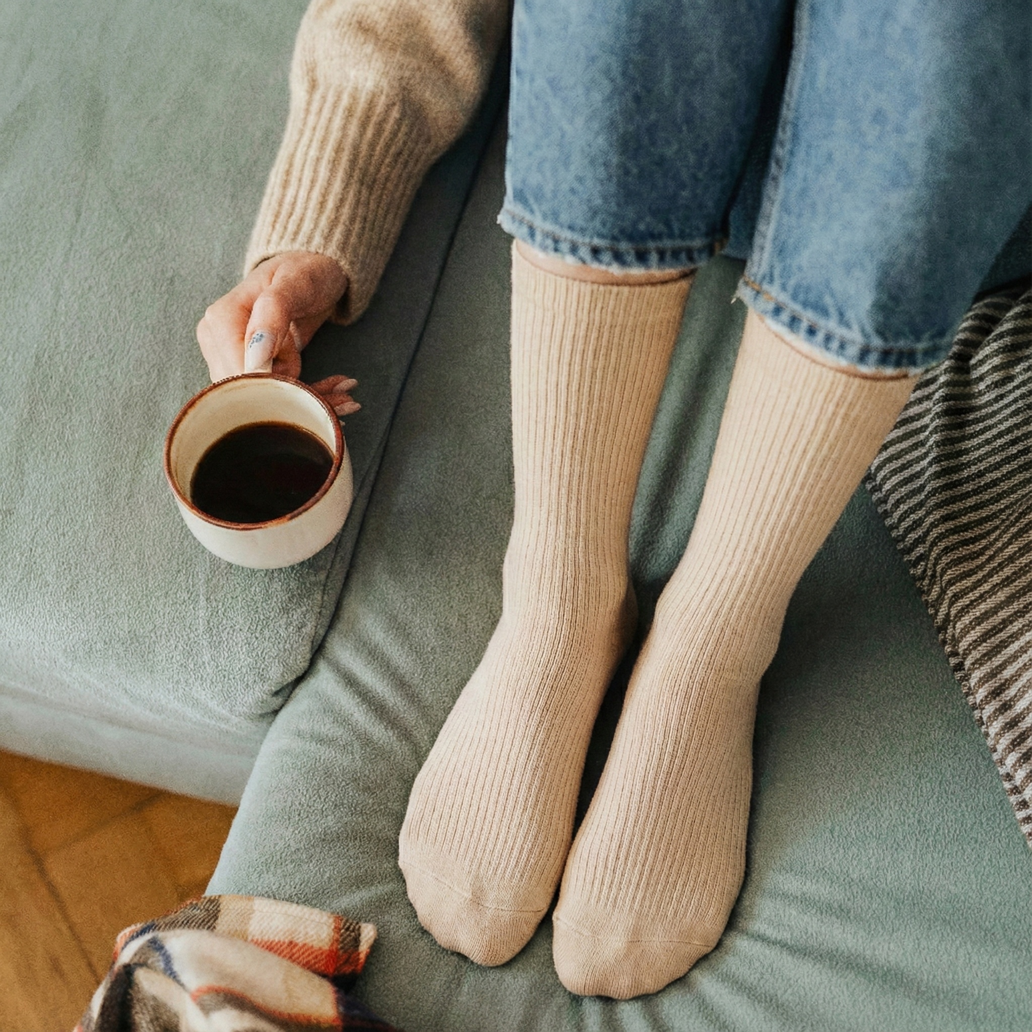 Happy woman relaxing with comfortable legs wearing compression socks